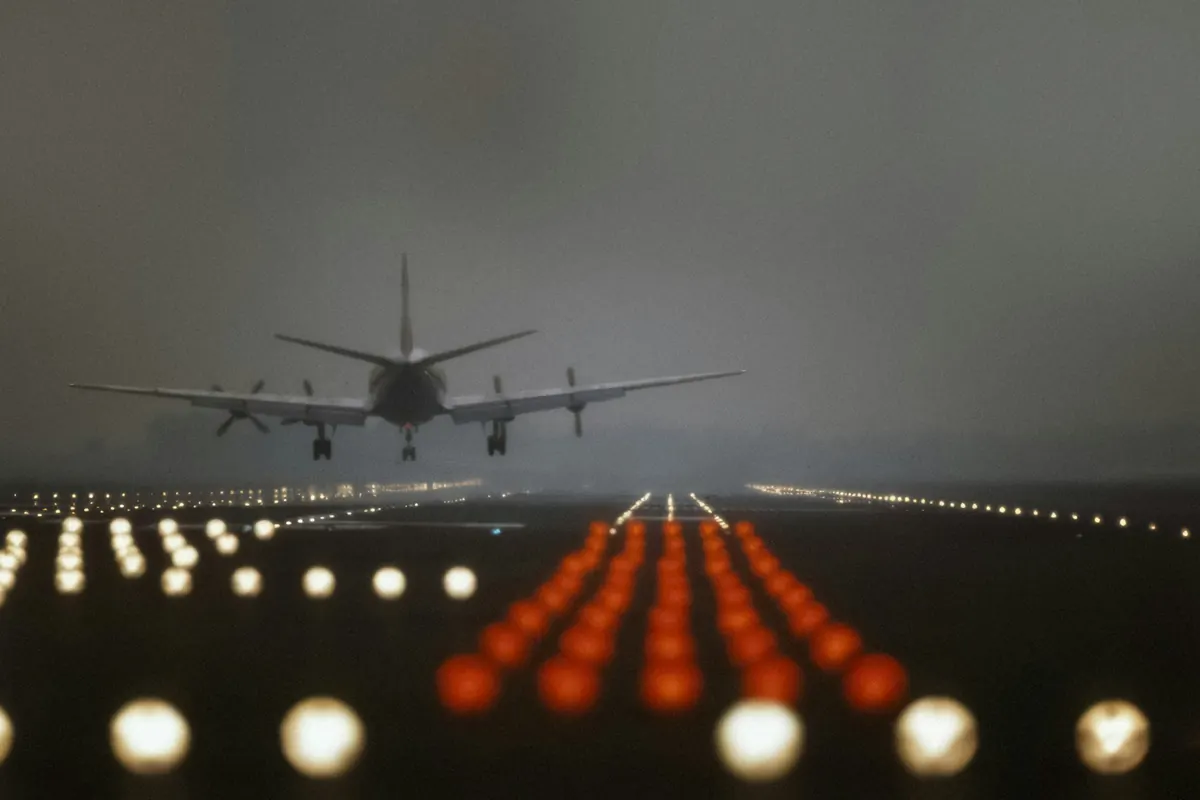 Runway approach lights glowing at night